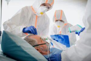 doctors tending to a person in a hospital