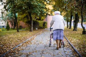 Elderly woman with the walker