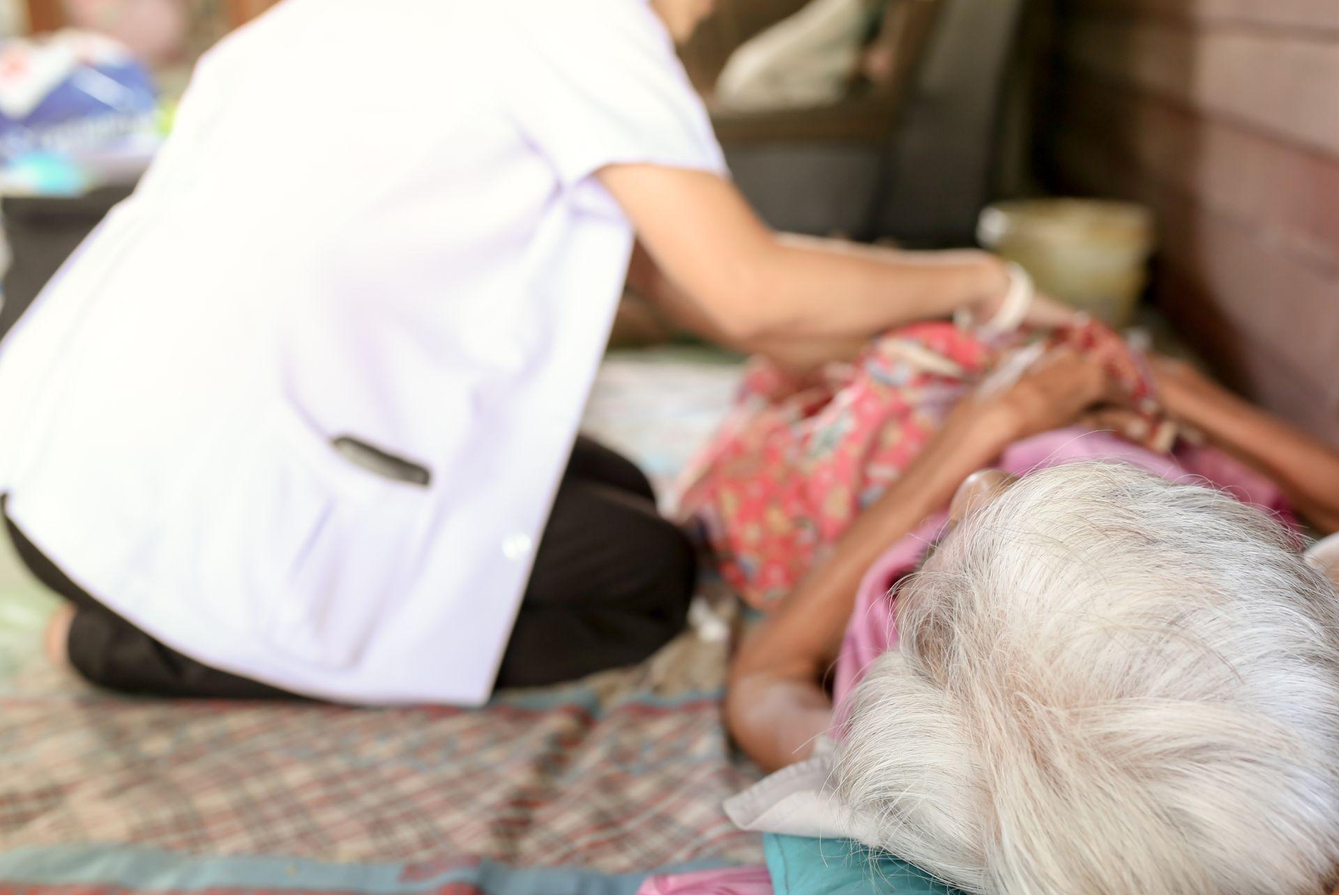 Nurse assisting a patient