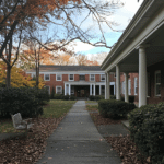 the exterior of a nursing home on an autumn day