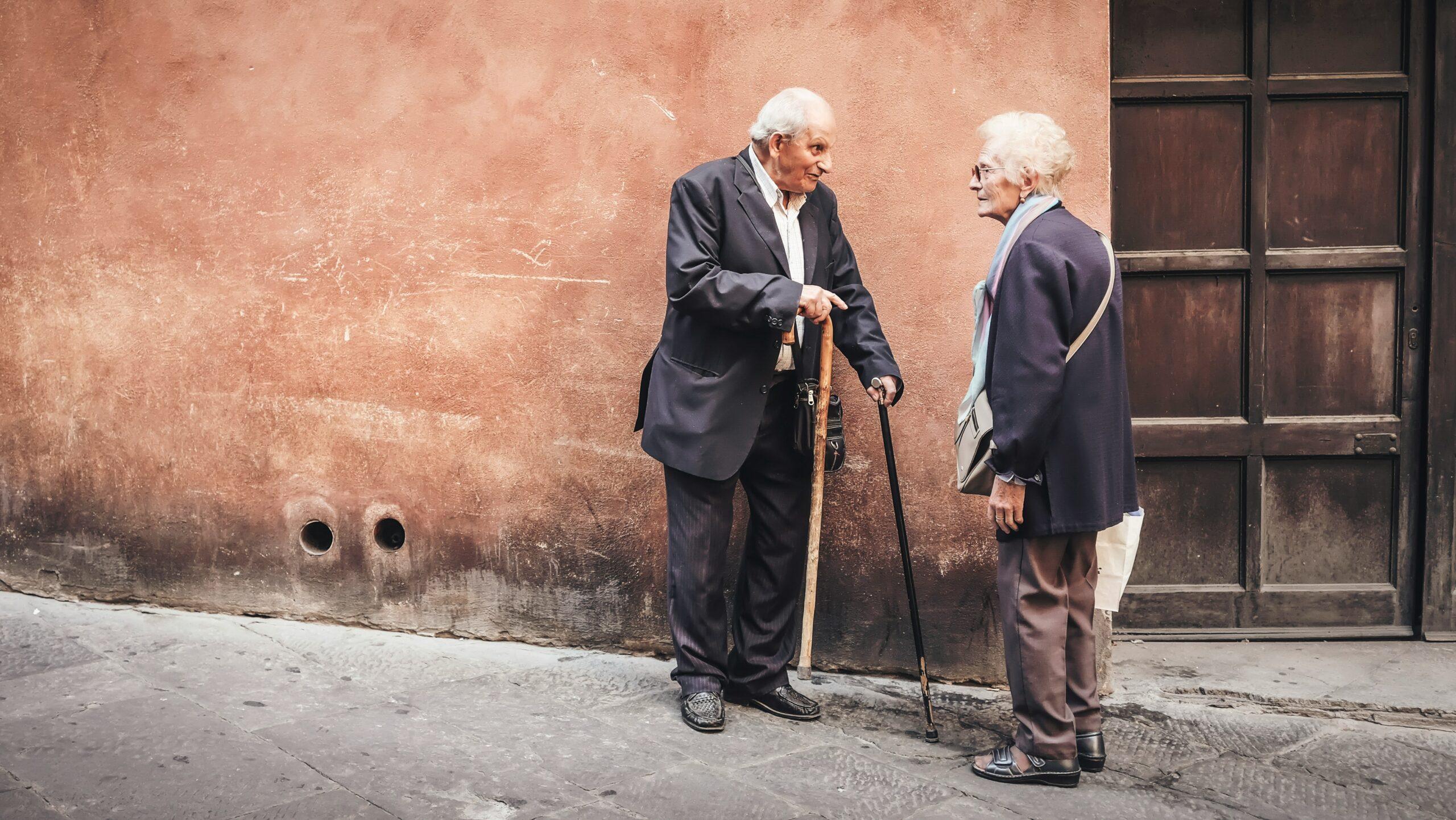 elderly couple talking