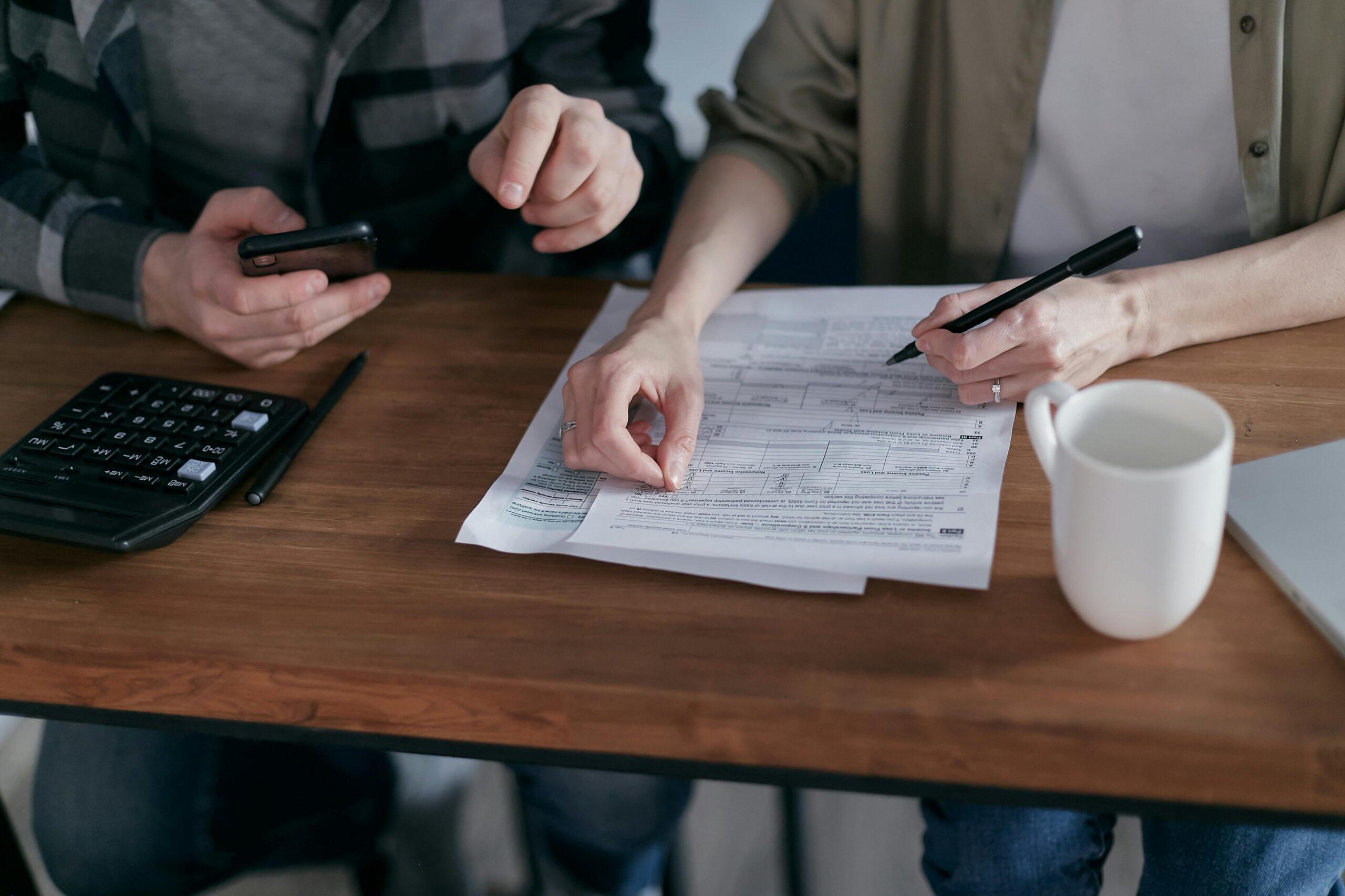 people calculating debt