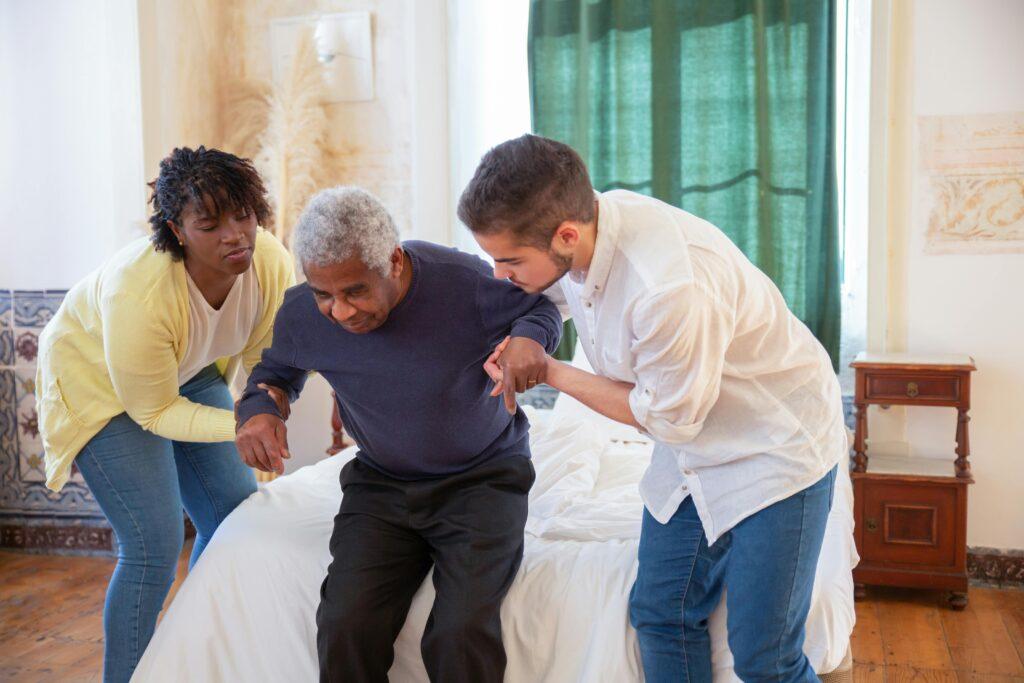 elderly man getting help