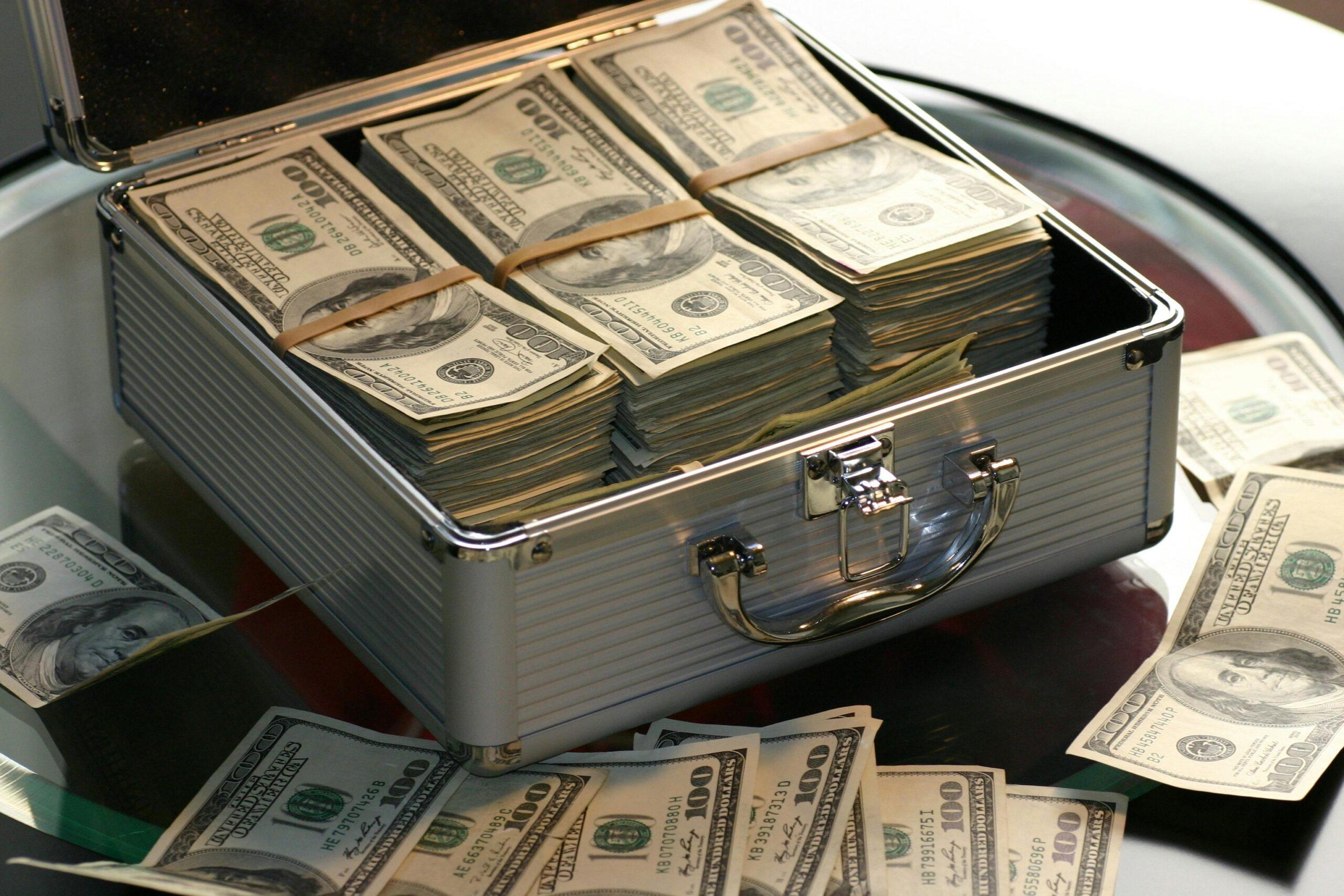 suitcase full of dollar bills